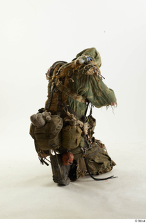 Photos John Hopkins Army Postapocalyptic Suit Poses aiming the gun…